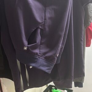 Figs Women's Scrub Top in Dark Purple and pants